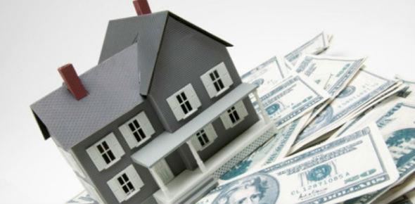 Вложить деньги в недвижимость или в доллары: что выгоднее